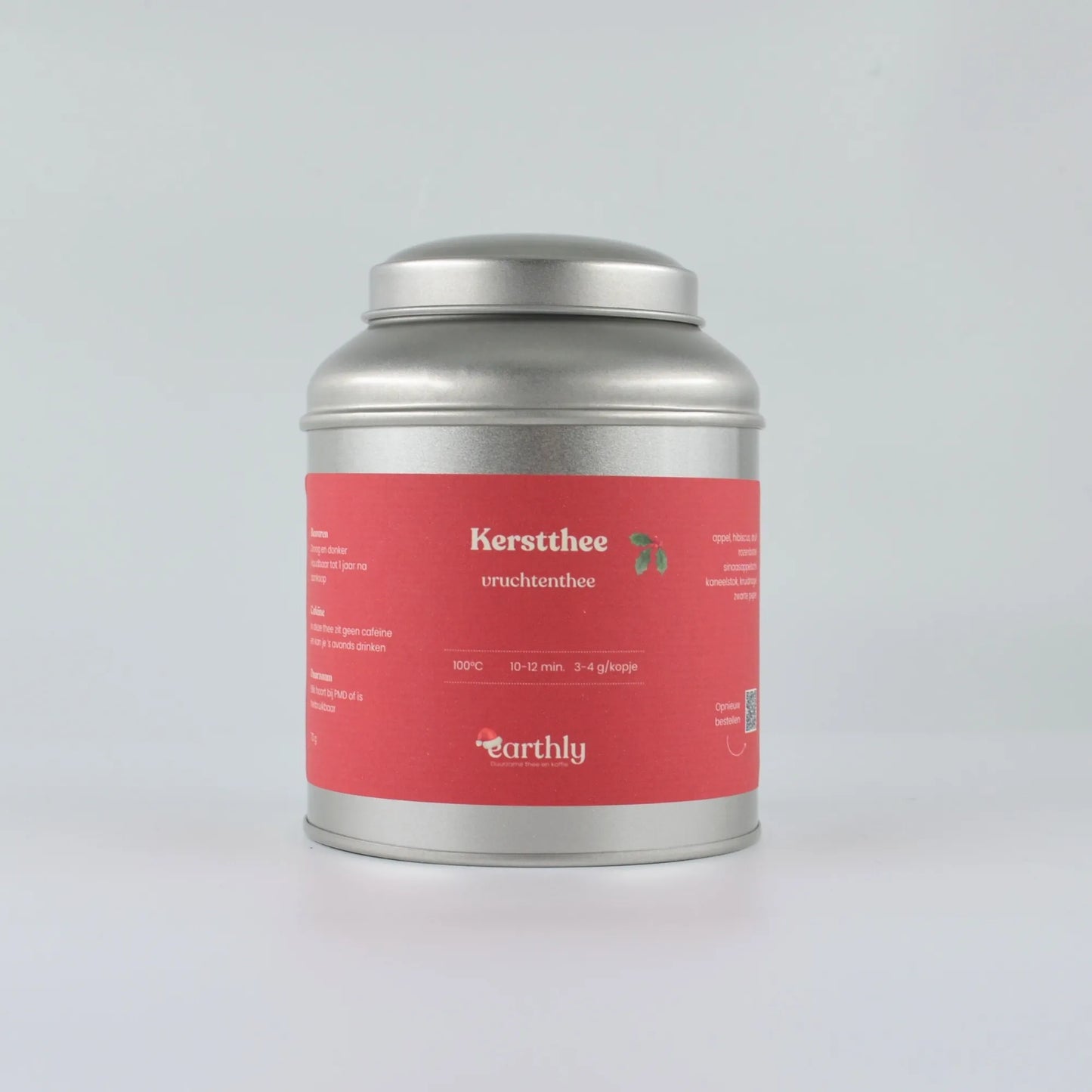 Zilverkleurig blik met rode Kerstthee vruchtenthee label van Earthly