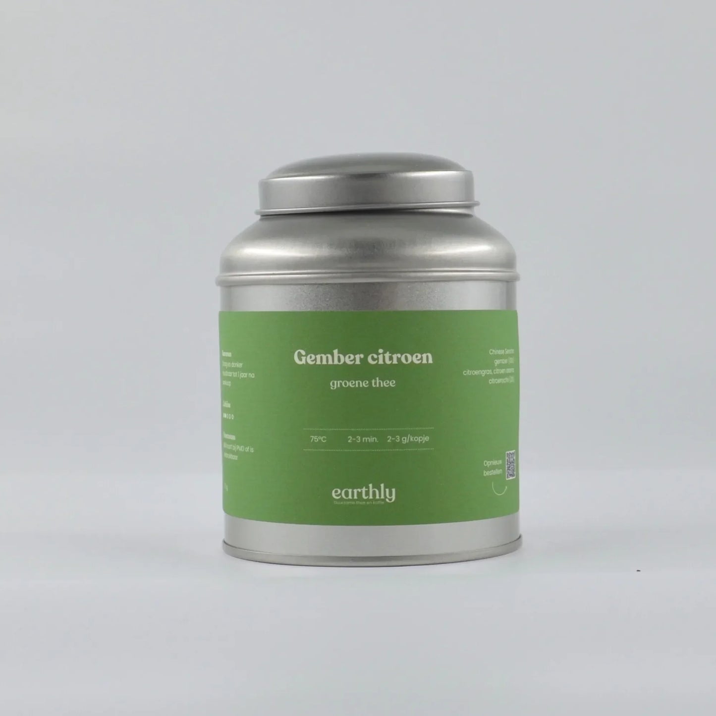 Zilverkleurig theeblik met groene label van gember citroen groene thee van Earthly