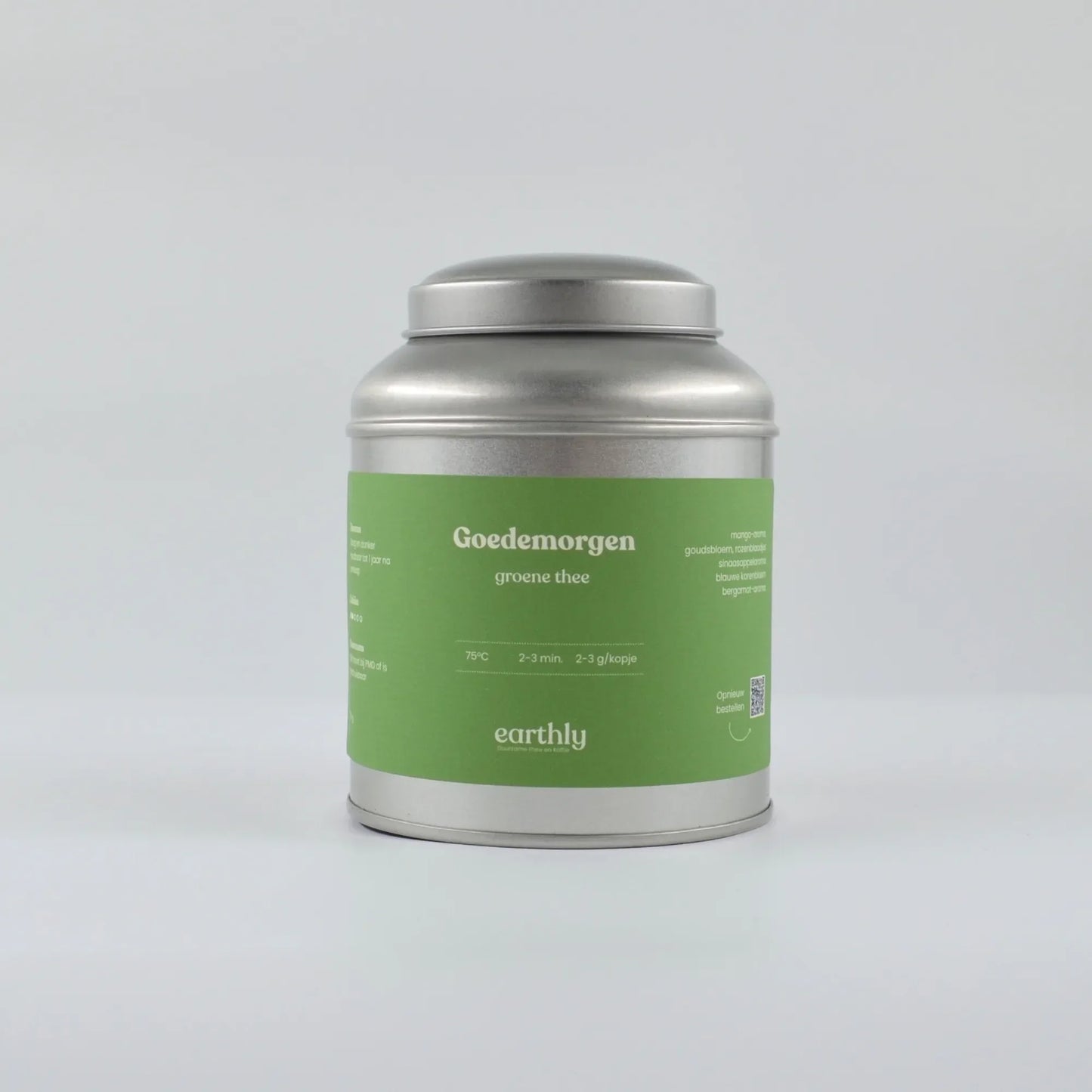 Earthly Goedemorgen groene thee blik met groene label en zilveren deksel op witte achtergrond