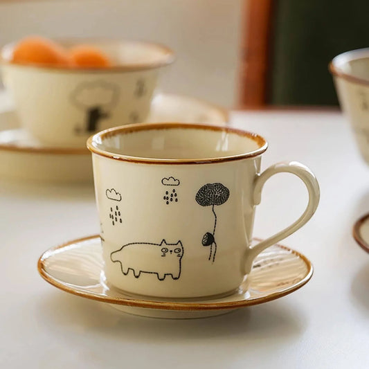 koffiekop met kattentekeningen