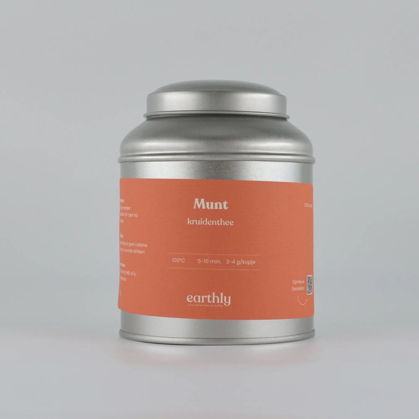 Zilverkleurige theeblik met oranje label, munt kruidenthee van Earthly