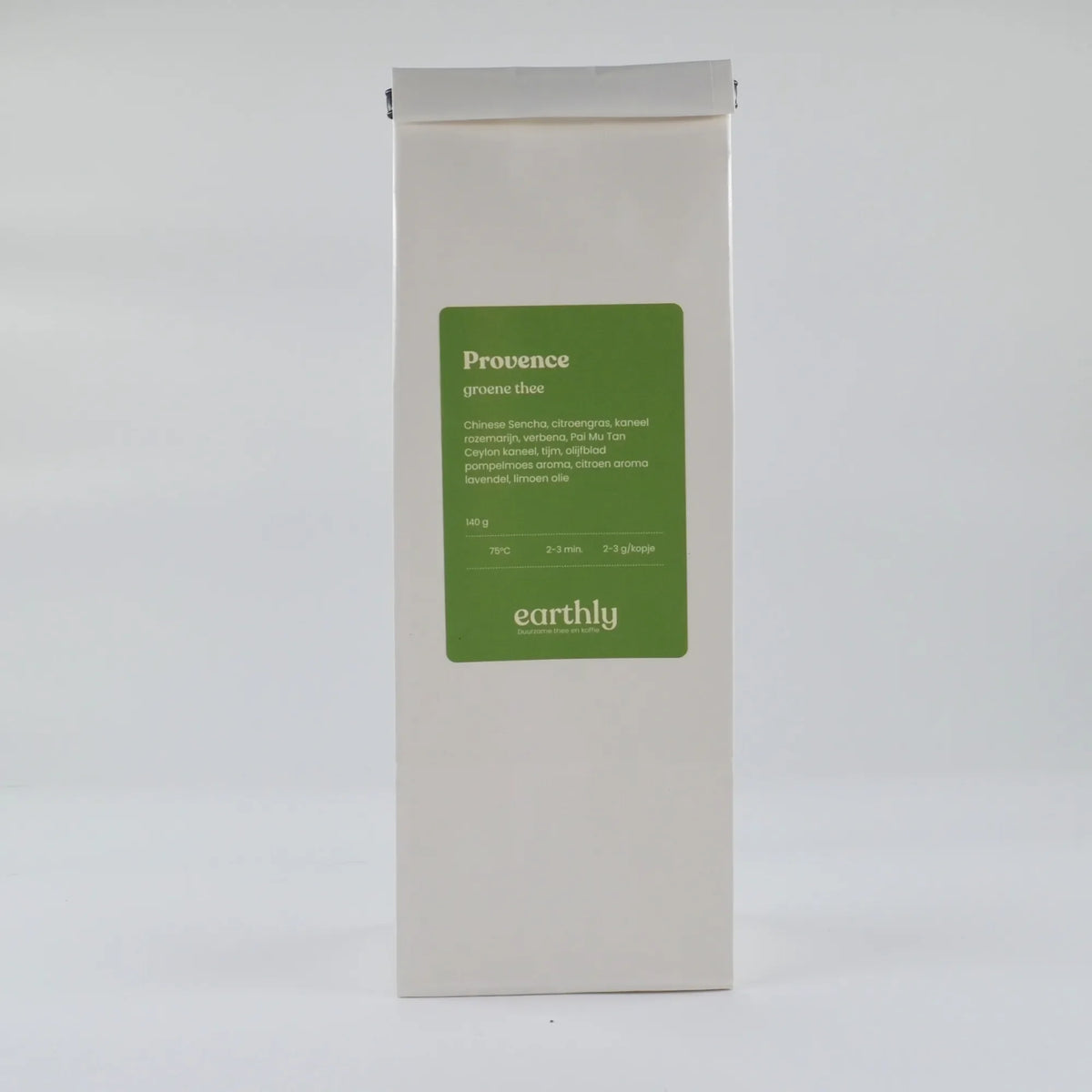 Verpakking Provence groene thee met ingrediëntenlijst en Earthly merk op witte achtergrond