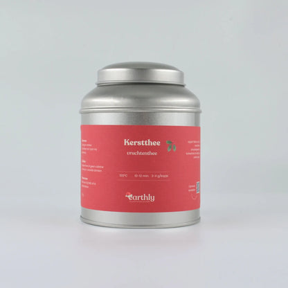 Zilverkleurig blik met rode Kerstthee vruchtenthee label van Earthly