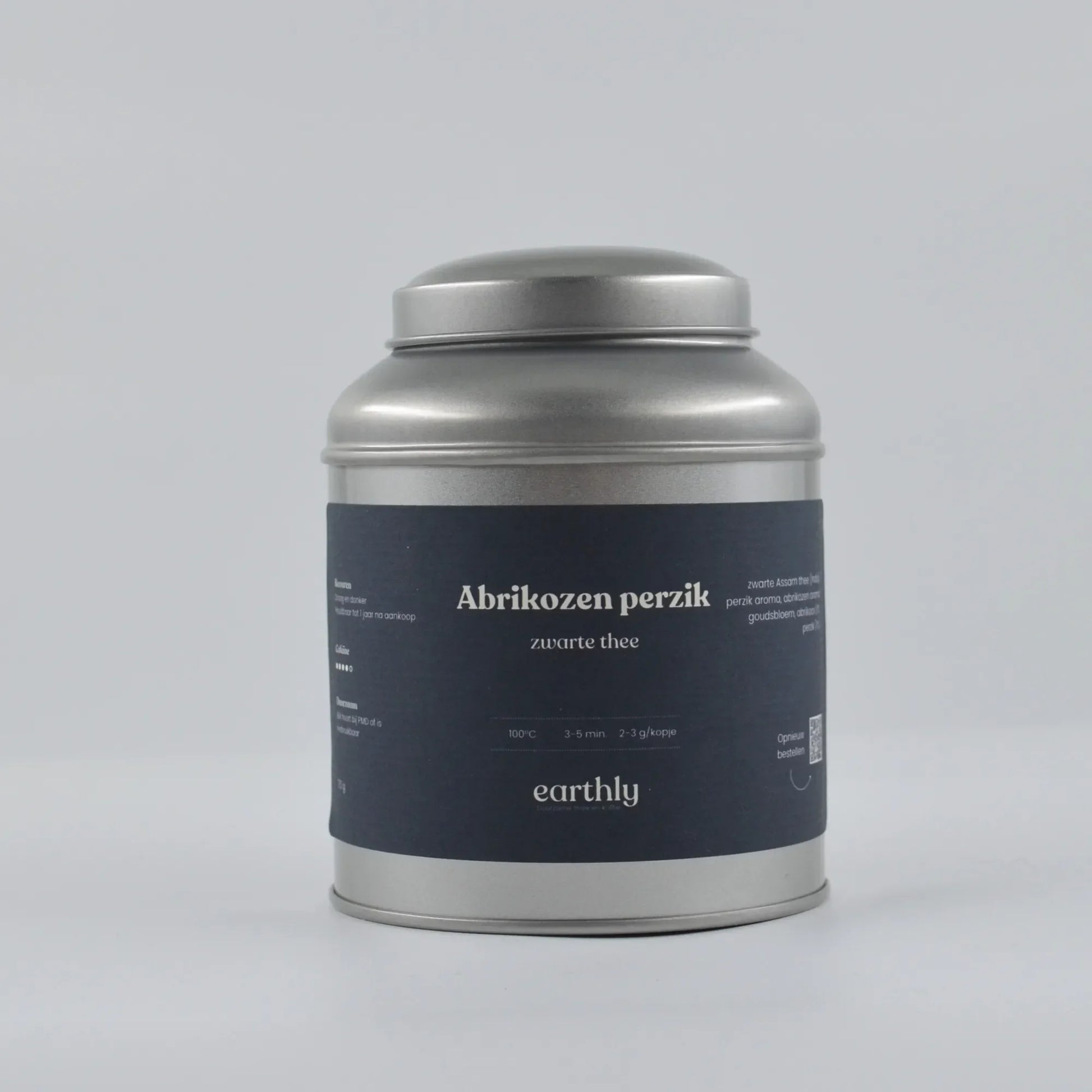 Zilverkleurig theeblik met zwarte label Abrikozen perzik zwarte thee van Earthly