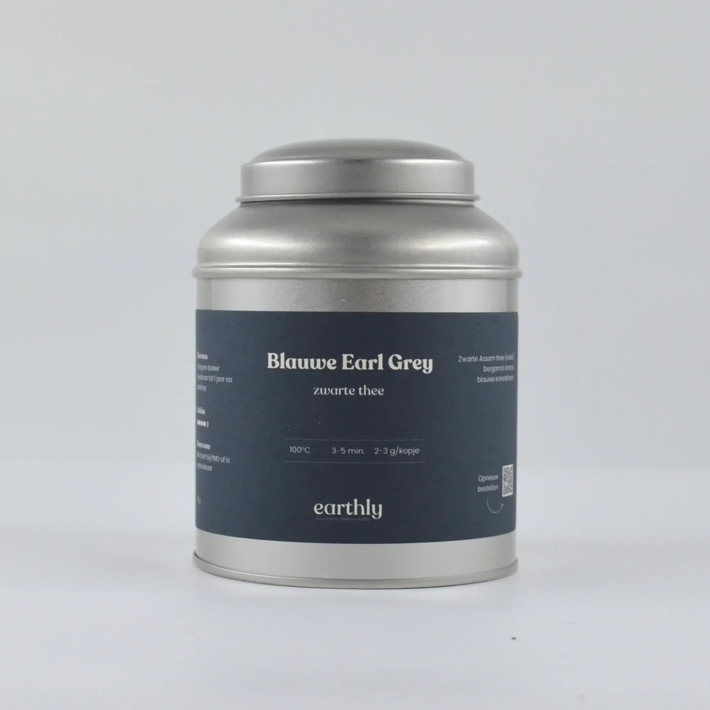 Zilveren theeblik met donkerblauw etiket van Blauwe Earl Grey zwarte thee van Earthly