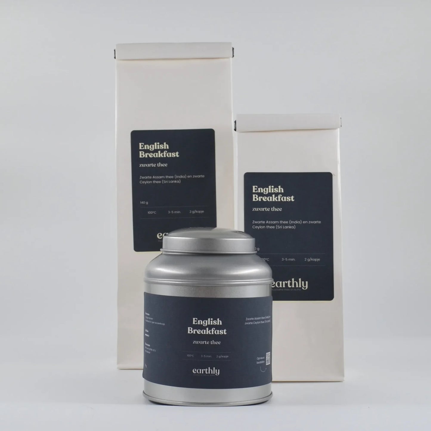 English Breakfast zwarte thee verpakkingen en blik van Earthly, Assam en Ceylon thee