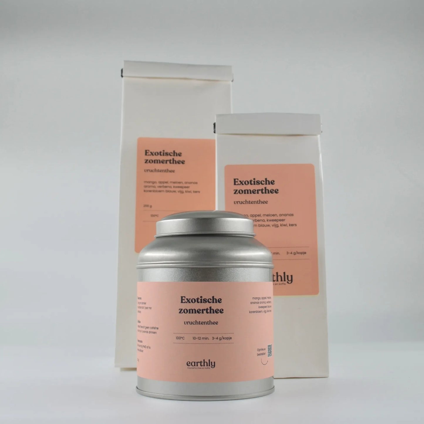 Verpakkingen van exotische zomer vruchten thee van Earthly, metalen blik en papieren zakken