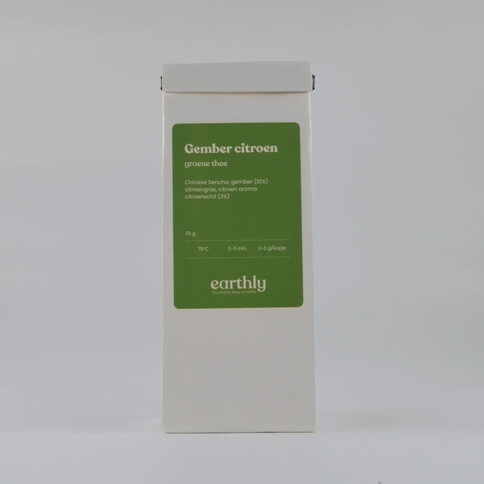 Witte doos met groene label van Gember citroen groene thee van Earthly, 70g