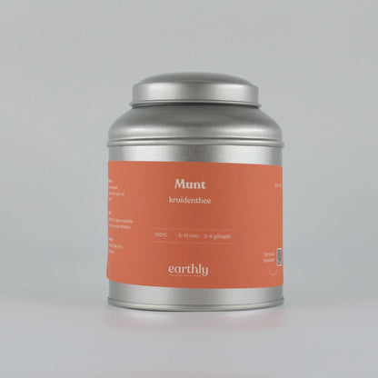 Zilverkleurige theeblik met oranje label, munt kruidenthee van Earthly