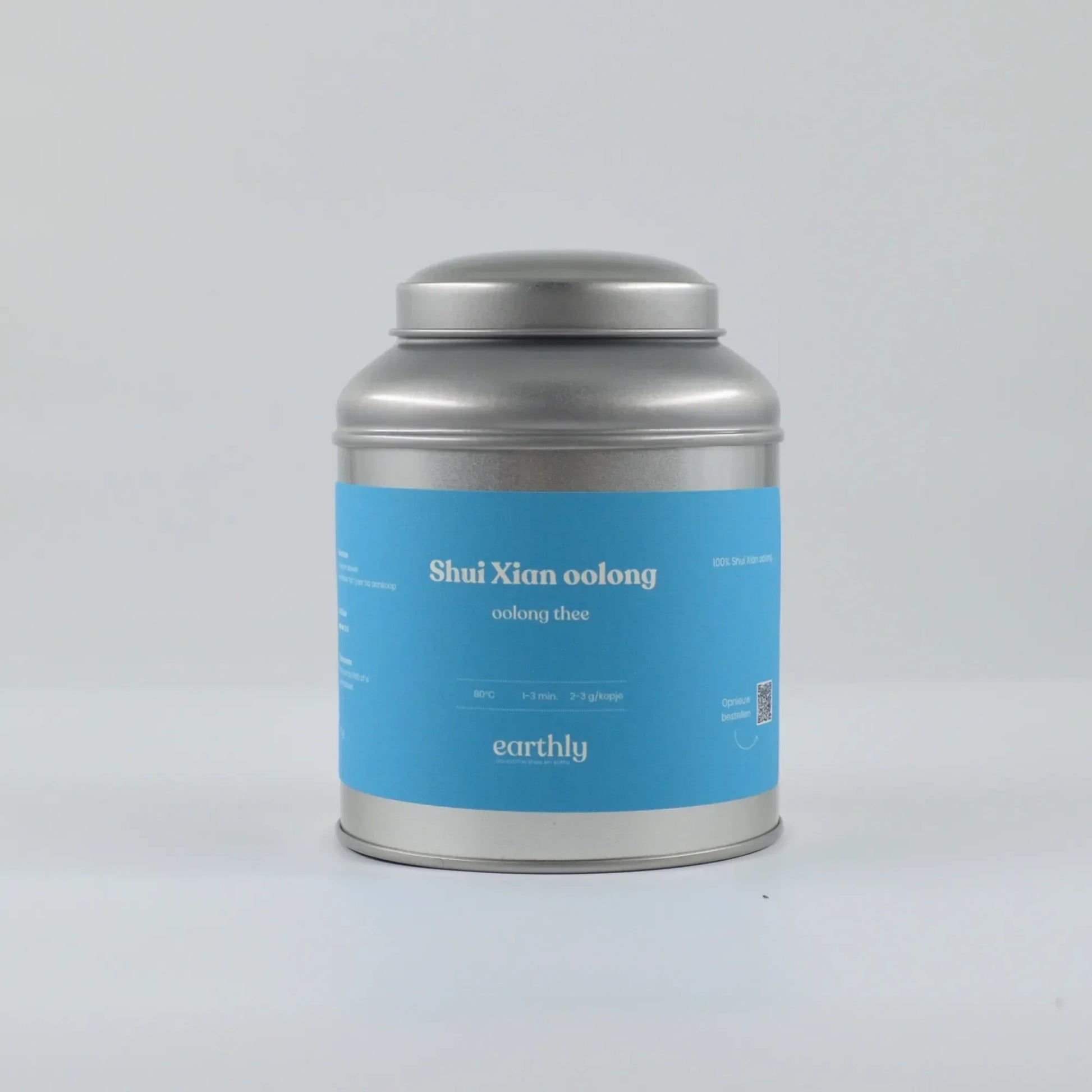 Metalen theeblik met blauwe etiket Shui Xian oolong thee van Earthly
