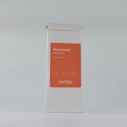 Witte verpakking rozenbottel kruidenthee 70g van Earthly met rood etiket
