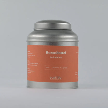 Zilverkleurig blik met oranje etiket Rozebottel kruidenthee van Earthly