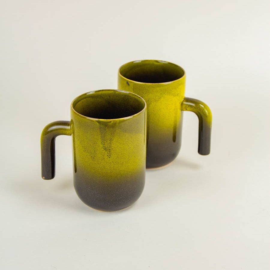 Set van twee groene mokken